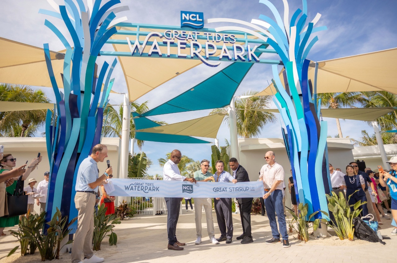 Norwegian Cruise Line® hosted a ribbon cutting ceremony for the all-new Great Tides Waterpark on the Company’s private island in the Bahamas, Great Stirrup Cay. From Left to Right: Froggy of Elvis Duran and the Morning Show; Randy Rolle, Member of Parliament of Bimini and the Berry Islands; Marc Kazlauskas, President of Norwegian Cruise Line®; John Chidsey, CEO of Norwegian Cruise Line Holdings Ltd.; Herschel Walker, United States Ambassador to the Commonwealth of The Bahamas; and Dan Farkas, Executive Vice President and General Counsel of Norwegian Cruise Line Holdings Ltd.