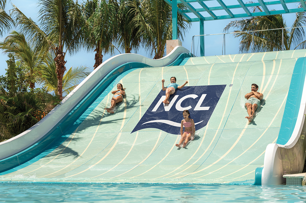 Cliffside Cove at Norwegian Cruise Line®’s Great Tides Waterpark boasts The Great Slide, the Caribbean’s only family slide where four guests can slide down together.